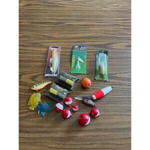 Assorted Fishing tackle lures bobbers safety tape